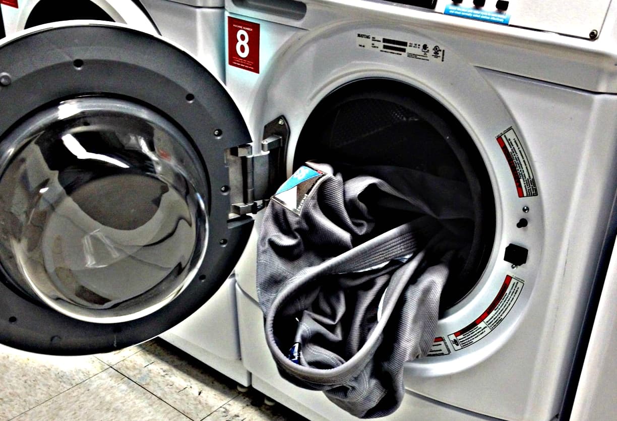 How to Wash a BJJ Gi (Without Shrinking or Ruining It) — featured image | Let's Roll BJJ