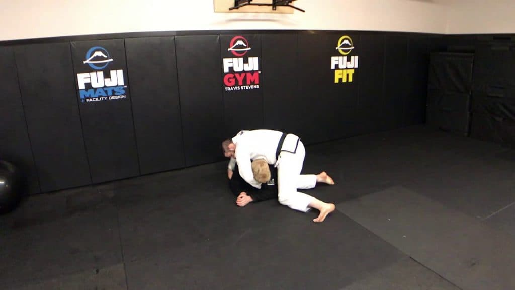 Front headlock control before the submission
