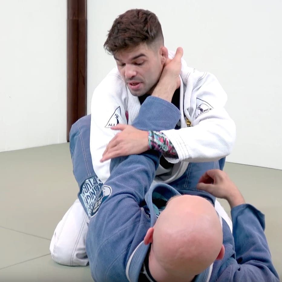 Standing up inside closed guard without giving away balance