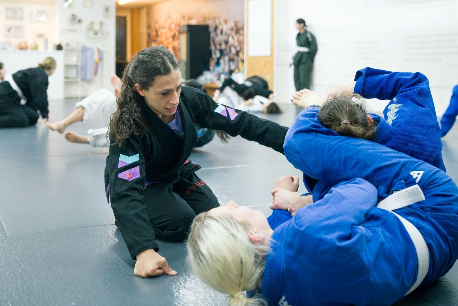 Illustrative coached partner work at BJJ Academy Amsterdam