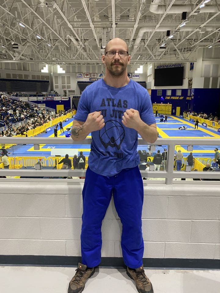 Between BJJ matches, waiting is part of the event